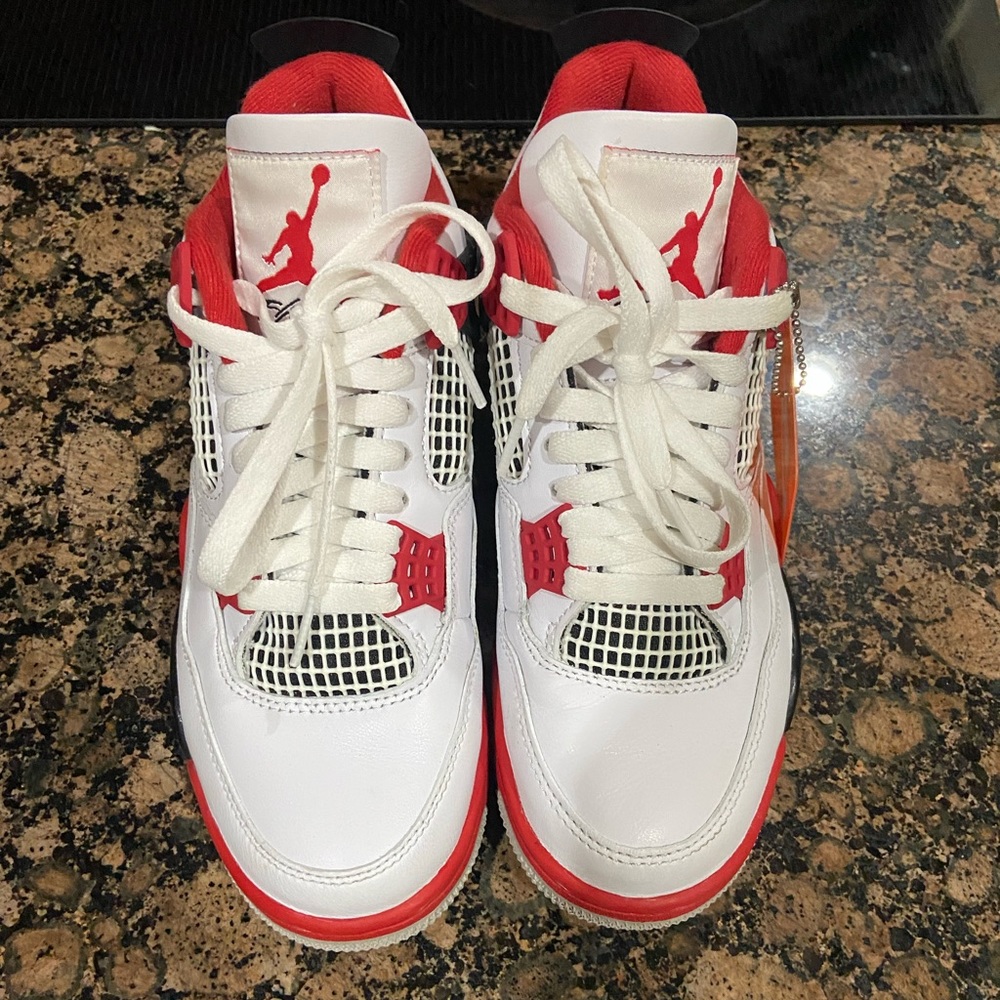 Worn once Air Jordan 4 Fire red.
